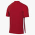 Back view of a red short-sleeved athletic jersey with a subtle textured pattern and a vertical white stripe on the right side.