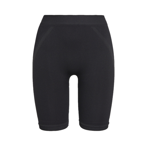 A pair of black high-waisted athletic bike shorts with seamless construction and textured side detailing.