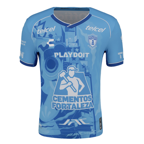 Light blue Pachuca soccer jersey with blue graphic patterns and sponsor logos like Telcel and Cementos Fortaleza.