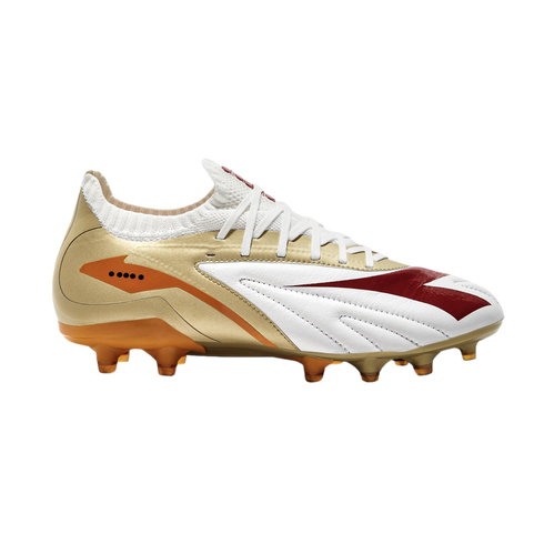 A gold, white, and maroon Diadora soccer cleat with orange studs, shown in profile against a white background.