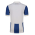 Back view of a white Charly brand jersey with royal blue sleeves. Features blue block details at the bottom hem and thin gold stripes on the collar and cuffs.