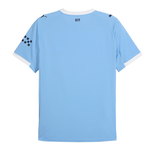 The back of a light blue short-sleeved football jersey with white trim, Puma shoulder logos, and "CITY" printed on the upper back.