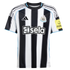 Newcastle United home jersey with black and white vertical stripes, blue trim, club crest, Adidas logo, and "sela" sponsor. A yellow "noon" patch is visible on the sleeve.
