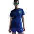 A person wears a blue Nike Brazil national team soccer jersey with leopard print patterns, matching shorts, and iridescent sports sunglasses against a white background.