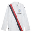 A white long-sleeved Manchester City soccer jersey with a polo collar, featuring a diagonal red and black sash and "KidSuper" branding on the chest.