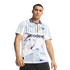 A man models a white soccer jersey with blue stripes and a marbled pattern, featuring the "codere" sponsor logo and a blue collar, set against a plain white background.