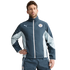 A man wearing a blue and light-blue Puma track suit featuring the Manchester City F.C. crest.
