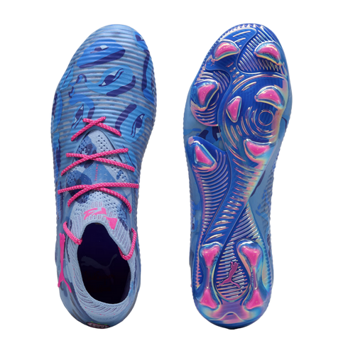 Top and bottom views of blue Puma soccer cleats with a patterned upper, bright pink laces, and an iridescent blue and pink studded sole.
