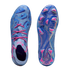 Top and bottom views of blue Puma soccer cleats with a patterned upper, bright pink laces, and an iridescent blue and pink studded sole.