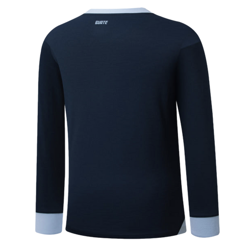 Back view of a navy blue long-sleeved shirt with light blue collar and cuffs. The word "GUATE" is printed in white near the neckline.