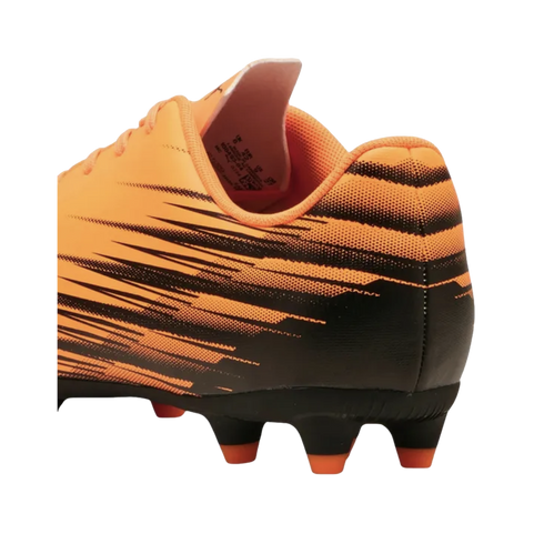 Rear-view of an orange and black soccer cleat with a graphic streak pattern and orange-tipped studs, set against a black background.