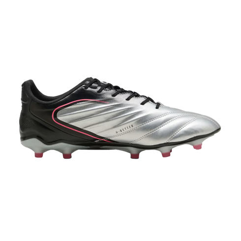 Profile view of a silver and black soccer cleat with pink accents. The silver upper has diagonal grooves and 'K-BETTER' text, with pink-tipped studs on the sole.