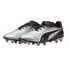 A pair of silver and black Puma soccer cleats with pink accents and studs, displayed against a solid black background.