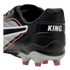 A close-up of the heel of a black PUMA King soccer cleat, featuring silver and pink accents, white "KING" branding, and pink-tipped studs.