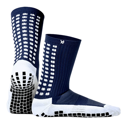 Pair of navy blue and white athletic grip socks with black non-slip pads on the soles, shown against a black background.
