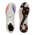 Top and soleplate views of a white Puma soccer cleat with red and blue graphics and orange studs against a black background.