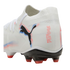 White Puma Future soccer cleat with a black cat logo, red and blue accents, and red-tipped studs against a black background.