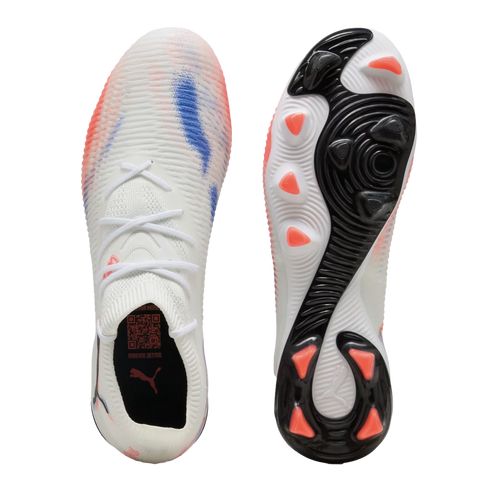 Top and bottom views of a white Puma soccer cleat featuring blue and pink spray-paint patterns and pink studs on a black and white sole.