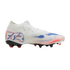 A white Puma soccer cleat with red and blue accents, featuring "FTR" branding on the heel and a black soleplate, displayed against a solid black background.