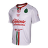 White Puma soccer jersey featuring red and green sponsor logos (Caliente, MG, Amazon Prime), a club crest, and vertical green and red stripes at the bottom.