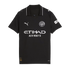 Black Manchester City football jersey with silver Puma and Etihad Airways logos and the club crest. Features a collar with white piping.