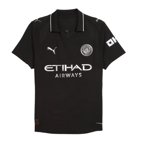 Black Manchester City Puma soccer jersey with silver team crest, Etihad Airways sponsor logo, and silver-trimmed collar.