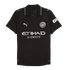 Black Manchester City Puma soccer jersey with silver team crest, Etihad Airways sponsor logo, and silver-trimmed collar.