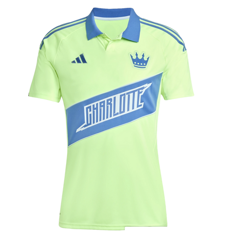 Charlotte FC neon yellow soccer jersey with blue accents, a crown crest, and a diagonal blue sash featuring the word "CHARLOTTE" in white.