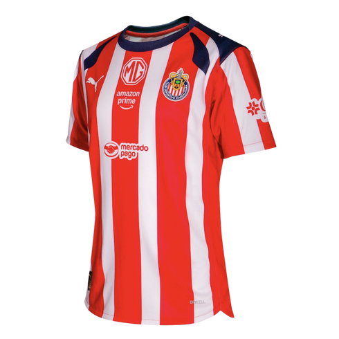 Red and white striped Chivas soccer jersey featuring Puma, MG, Amazon Prime, and Mercado Pago logos, with navy blue collar accents.