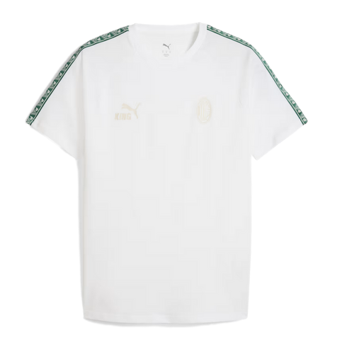 White Puma T-shirt featuring faint gold "KING" and AC Milan logos on the chest, with green and white patterned tape along the shoulders and sleeves.