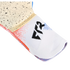 Close-up of a goalkeeper glove with a white knit wrist cuff featuring a black logo and a speckled tan palm, set against a black background.
