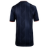 Back view of a navy blue short-sleeved jersey with a tonal vertical geometric pattern and thin orange trim on the collar and cuffs.