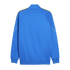 Back view of a blue track jacket featuring patterned shoulder tape, thin white sleeve accents, and ribbed trim, shown against a black background.