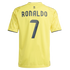 Back of a yellow soccer jersey featuring the name "RONALDO" and the number "7" in dark blue. A small palm tree logo is centered above the name.