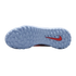 Sole of a light blue Nike athletic shoe featuring a pebbled traction pattern and a red swoosh logo on the heel.