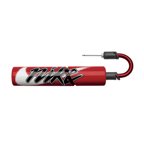 A compact red Nike ball pump with stylized branding, a short red hose, and an inflation needle, centered on a black background.