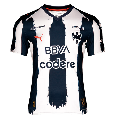 Monterrey FC home jersey with navy and white vertical stripes featuring brushstroke edges. Displays the club crest, red Puma logo, and BBVA and Codere sponsors.