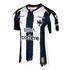 C.F. Monterrey soccer jersey featuring navy blue and white brushstroke stripes, club crest, Puma, BBVA, and codere logos, with a gold 80th-anniversary patch.