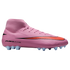 Side view of a pink high-top Nike soccer cleat with a red swoosh and light blue studs on a black background.