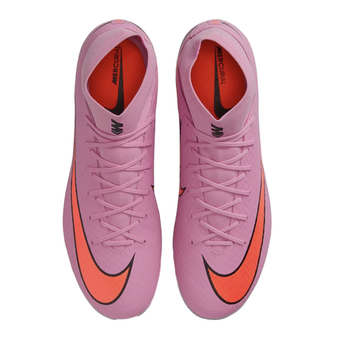 Top-down view of pink Nike Mercurial high-top soccer cleats with bright orange Nike swoosh logos on a black background.