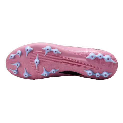 Bottom view of a pink soccer cleat with light blue plastic studs on a black background.