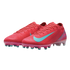 A pair of bright red Nike Mercurial Air Zoom soccer cleats with a teal swoosh and multicolored studs on a black background.
