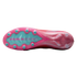 Underside of a pink and teal Nike soccer cleat featuring circular studs and "AIR ZOOM" branding on a light blue sole plate.