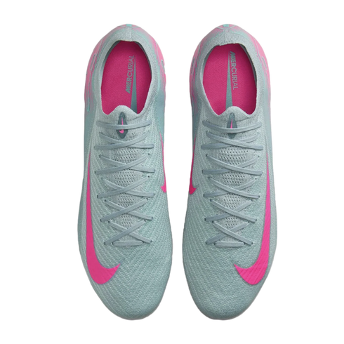 Top-down view of light blue Nike Mercurial soccer cleats with bright pink accents on a black background.