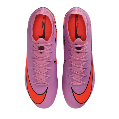 Top-down view of purple Nike Mercurial soccer cleats with bright orange swooshes and interiors, set against a plain black background.