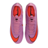 Top-down view of purple Nike Mercurial soccer cleats with bright orange swooshes and interiors, set against a plain black background.