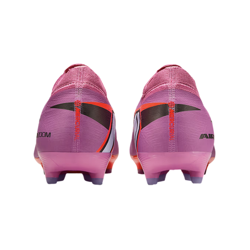 Back view of two pink and purple Nike Mercurial soccer cleats with black and orange accents on a black background.