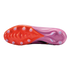 The underside of a Nike soccer cleat featuring a bright orange forefoot and purple heel with light blue circular studs, shown against a solid black background.