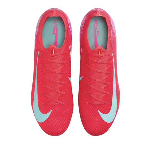 Top-down view of a pair of vibrant pink Nike Mercurial soccer boots with light blue accents, set against a solid black background.