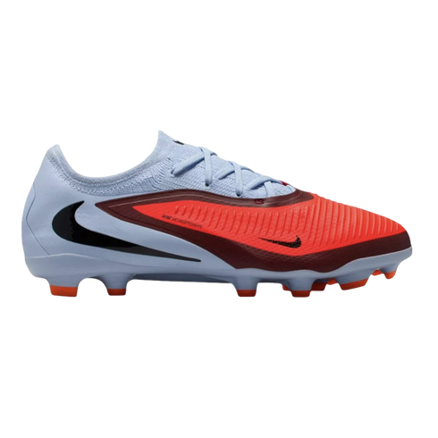 Side profile of a Nike soccer cleat featuring a light blue upper, a bright orange textured forefoot strike zone, and black Swoosh logos.